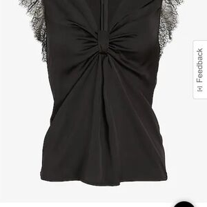 Brand new Express top. Beautiful and fine lace on sleeves. Knot derail in front.